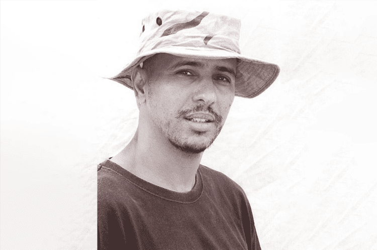 A man with a bucket hat