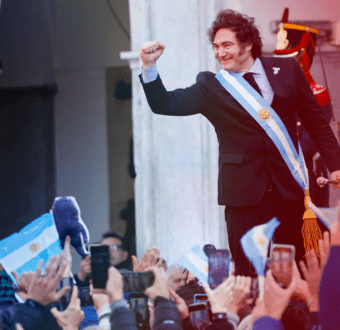 Argentina's President Javier Milei gestures to supporters outside the Cabildo during the commemoration of the 214th anniversary of the May Revolution, in Cordoba, Argentina May 25, 2024.